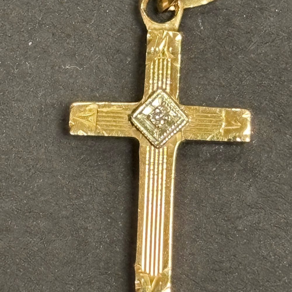 Elegant 14 k Gold Cross with diamond Pendant.